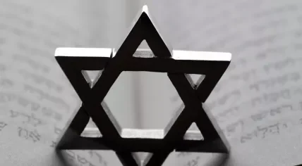 Jewish star or star of David on a Torah.