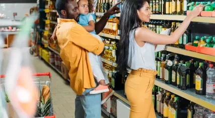 Young family shopping for groceries